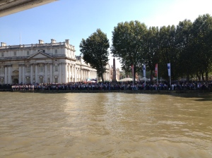 Crowds of people line the bank at Maritime Greenwich